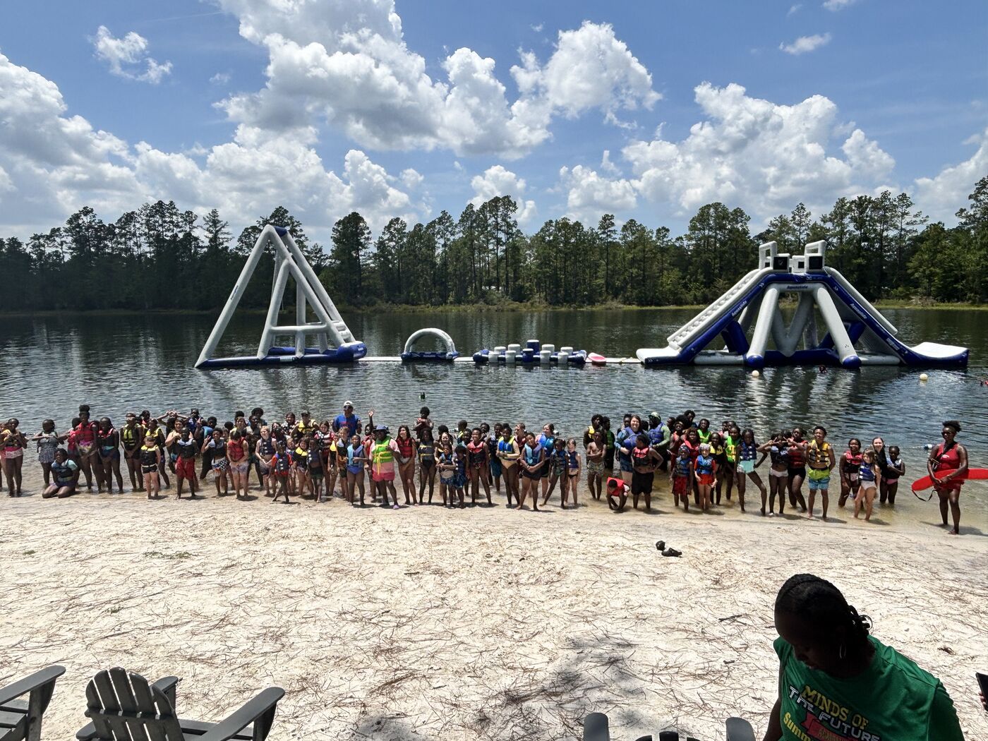 Campers gathered on the beach at McKenzie's Camp Deep Pond